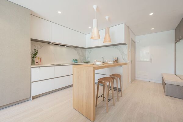 Un elegante apartamento de tres dormitorios en la planta baj