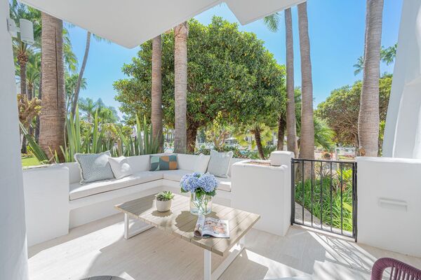 Un elegante apartamento de tres dormitorios en la planta baj