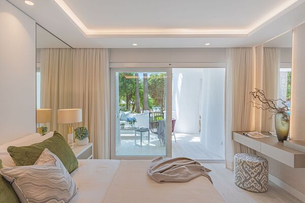 Un elegante apartamento de tres dormitorios en la planta baj