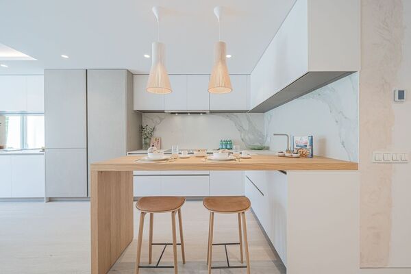 Un elegante apartamento de tres dormitorios en la planta baj