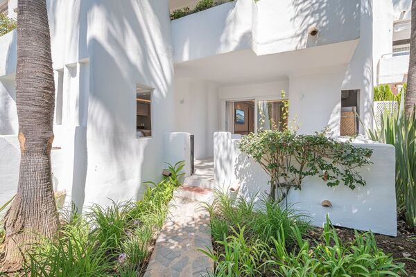 Un elegante apartamento de tres dormitorios en la planta baj