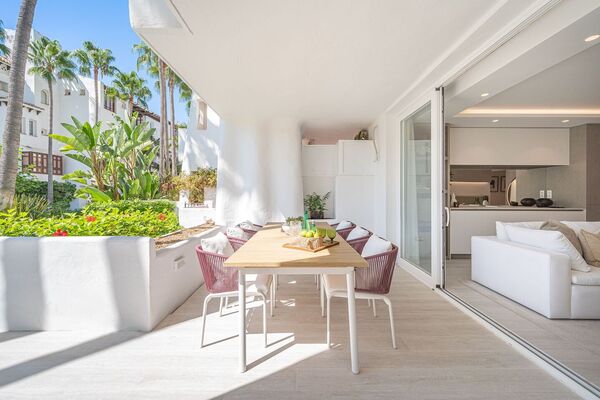 Un elegante apartamento de tres dormitorios en la planta baj