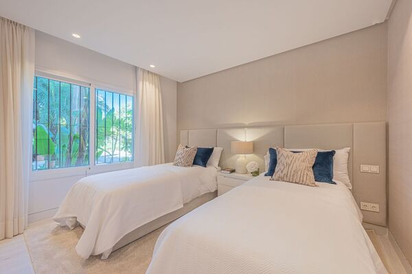 Un elegante apartamento de tres dormitorios en la planta baj