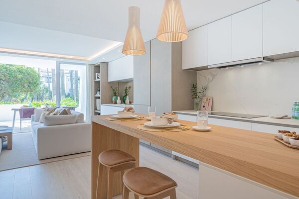 Un elegante apartamento de tres dormitorios en la planta baj