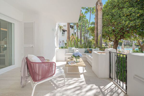 Un elegante apartamento de tres dormitorios en la planta baj