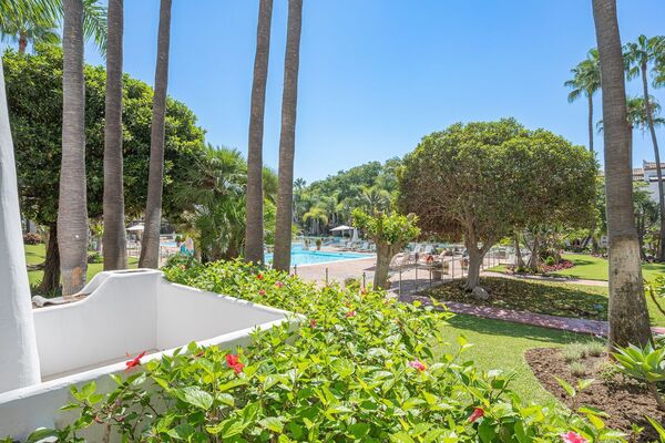 Un elegante apartamento de tres dormitorios en la planta baj