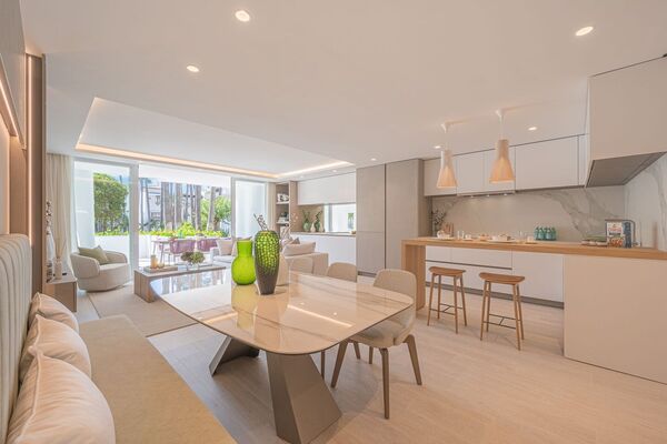 Un elegante apartamento de tres dormitorios en la planta baj