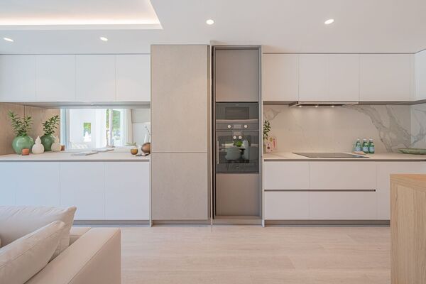 Un elegante apartamento de tres dormitorios en la planta baj