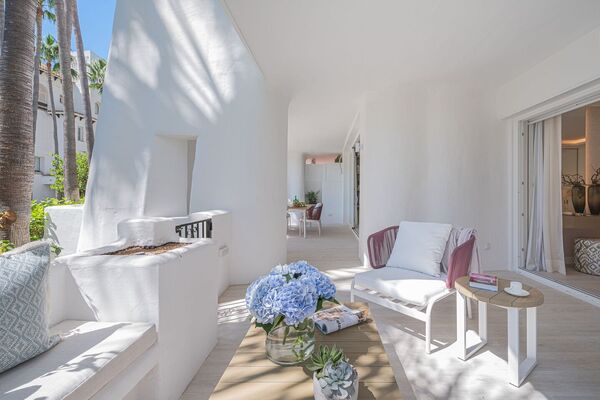 Un elegante apartamento de tres dormitorios en la planta baj