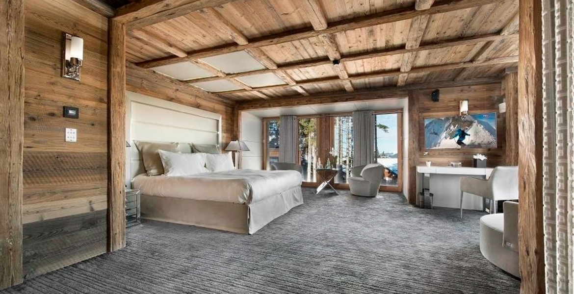 Suite-chalet Courchevel 1850 CHAMBRES EN SUITE - SALLE DE FÊ